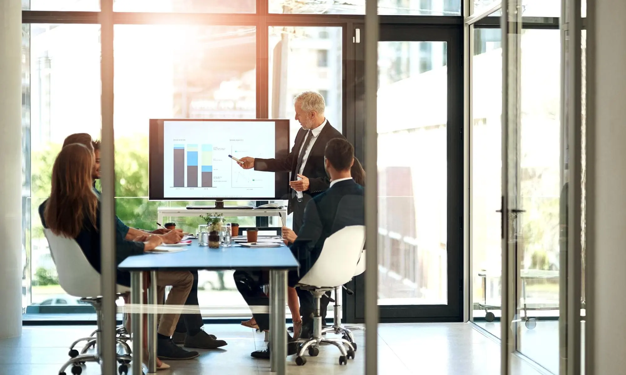 Presentation data and business people in meeting at office for corporate revenue project and finance review Statistics discussion and financ