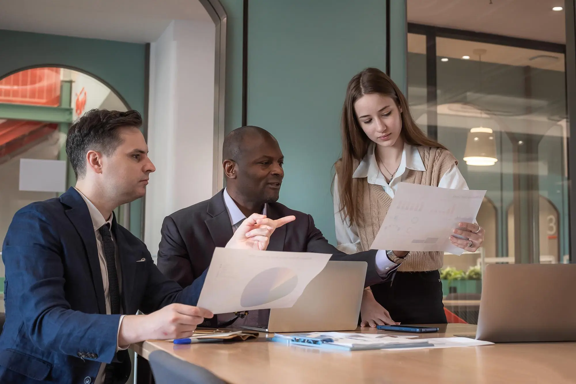 Business people or diverse colleagues working and meeting in modern office
