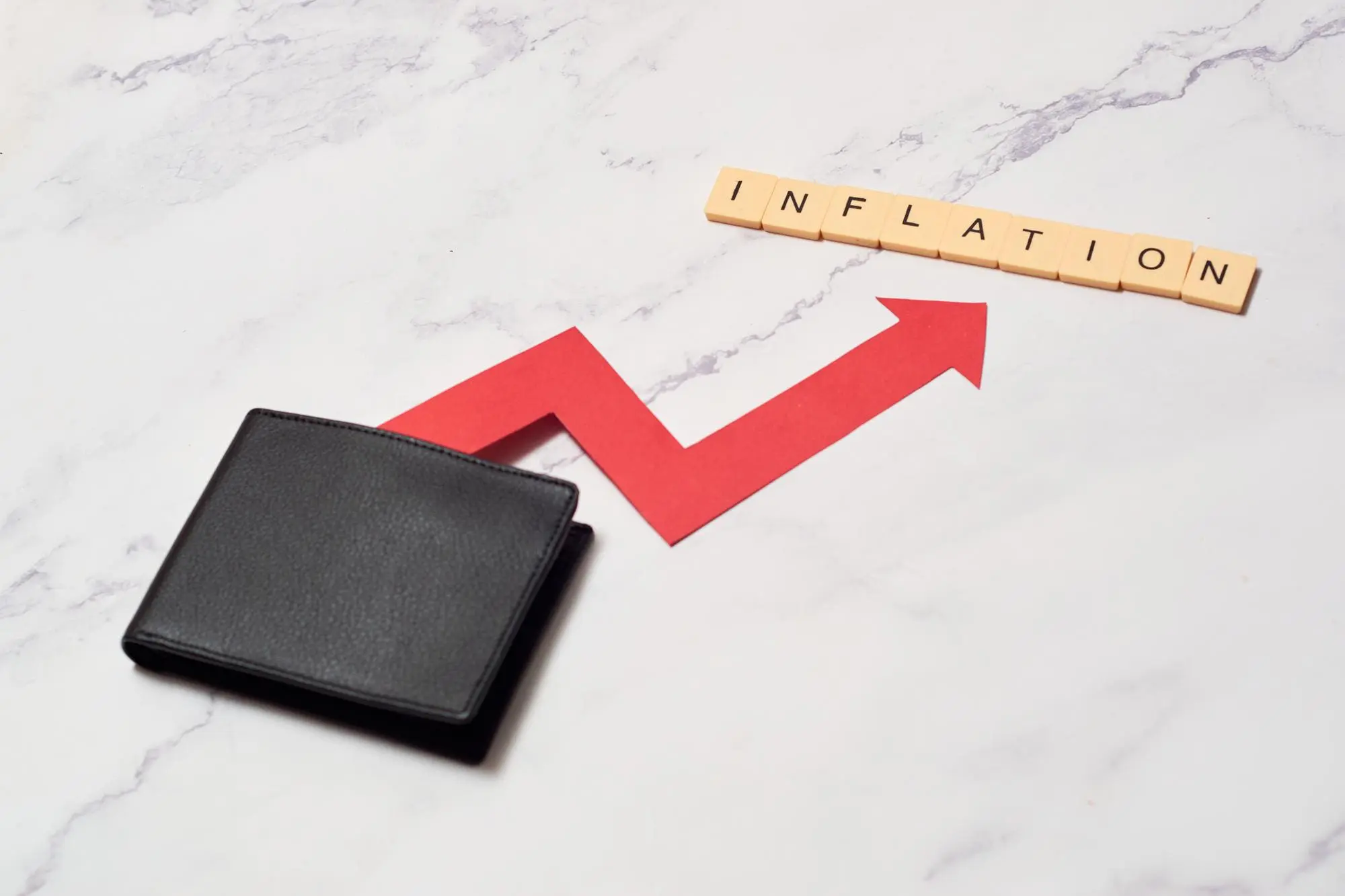 Wallet with crescent arrow Concept of inflation and economic crisis rising prices